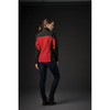 A women’s softshell jacket featuring a black and red design, displayed from the back against a dark background.