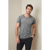A grey marled men's T-shirt with contrasting seams, featuring a logo on the chest, paired with black trousers.