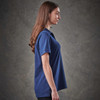 A women's navy polo shirt with a classic fit and short sleeves. Features a logo on the chest.