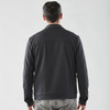 A man wearing a dark grey men's Soho jacket, viewed from the back, against a plain background.