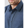 Men's short-sleeve button-up shirt in navy with a subtle dotted pattern and a chest pocket. Features branding.