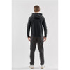 Men's Montebello pullover hoody in dark grey, featuring a hood and slim fit, worn with matching pants.
