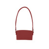 A drink bottle holder in a deep red colour with a long strap and metal clasps. It features a logo.