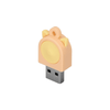 A peach-coloured USB flash drive with a round button and small ears, featuring a logo on the side.