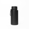 A drink bottle in matte black stainless steel, featuring a silicone handle and a lid with a metal loop.