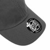 A grey cap featuring a circular logo and a curved brim, designed as premium headwear.