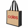 A large jute tote bag with a beige body and black handles, featuring a logo on one side.