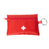 A red first aid travel kit with a zipper and key ring, featuring a white cross symbol on the front.