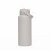 A drink bottle in a neutral grey colour featuring a flip-top lid and a carrying handle. It has a logo on the side.