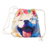 A foldable drawstring towel featuring a colourful design of a smiling dog with a vibrant background. It has a drawstring closure.