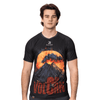 A black sublimated tee featuring a vibrant volcano graphic in red and orange hues, with a logo on the chest.