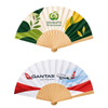 A wooden hand fan featuring two designs: one with green leaves and the other with an airplane and airline branding.