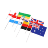 A collection of handheld flags including the Australian, English, German, South Korean, and rainbow flags, displayed on white poles.
