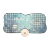 A foldable car sun visor in blue and white featuring a car design and a circular storage pouch.