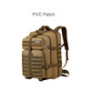 A tan tactical backpack featuring multiple compartments, straps, and a PVC patch area. 