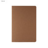 A brown notebook with a natural finish featuring rounded corners and a simple design. It has a logo on the cover.