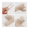 Translucent plastic magnetic clips in a light brown colour, showcasing different angles and a hand holding one clip.