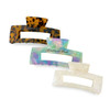 A set of three hair claw clips in tortoiseshell, iridescent, and white colours, featuring a branding logo.