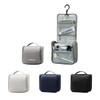 A hanging travel toiletry bag in grey, black, and navy, featuring compartments and a hook for easy access.