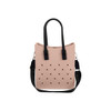 A pink EVA tote bag with black handles, featuring perforated holes and a detachable shoulder strap.