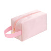 A pink flannel cosmetic bag with a zip closure and a strap on one side, featuring a branding logo.