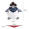 A Kookaburra plush toy featuring grey and white fur, with a blue bandana and a logo at the base.