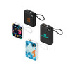 A collection of four power banks in black and white, featuring various designs and a logo on each.