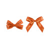 Two adhesive bows in a rich chocolate colour, one larger and one smaller, featuring printed text.