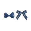Two navy blue hair clips in bow shapes, one featuring the word "Forward" and the other with "Chocolate" printed on it.