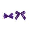 Two purple adhesive bows, one with "Forward" and the other with "Chocolate" in gold lettering.