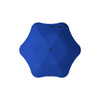 A blue BLUNT Metro Umbrella with a unique six-pointed design, featuring a central button.