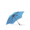 A blue BLUNT Metro Umbrella with a sleek design and a sturdy frame. It features a logo on the handle.