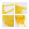 A yellow mesh grocery bag with inner lining, featuring a woven design and sturdy straps. The bag has a logo.