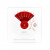 Acrylic desk calendar with a circular design featuring red and white colours, showcasing days of the week and decorative elements.