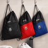 Three drawstring bags hang on hooks; one black, one red, and one blue, each featuring a logo and zip pocket.