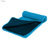 A sky blue cooling towel rolled partially open, featuring a textured surface on one side and a smooth side. It has a logo.