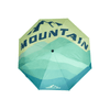 A 21'' automatic compact folding umbrella in green and teal with a mountain design and logo.