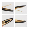 An acetate hair alligator clip in black and gold, featuring a textured grip and a sleek design.