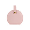 A small portable jewellery box in soft pink PU leather, featuring a rounded design and a gold fastener.