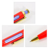 A rocket-shaped pen in red with a gold clip and blue accents. It features a branding logo and a unique spin message.