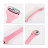 A pink ice massager roller with double heads and a textured handle. Chrome accents are visible on both ends.
