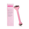 A pink ice massager roller with double heads, featuring a textured handle and a box in the background.