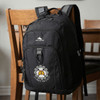 A black High Sierra Extension Backpack 39L with a logo on the front, resting on a wooden chair.
