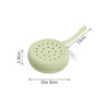 A round, light green silicone pouch with holes, featuring a zipper and a loop for easy carrying.