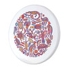 A circular ceramic coaster featuring vibrant, multicoloured Aboriginal-inspired designs of various animals.