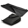 A black picnic blanket laid out flat, featuring a quilted texture, with a folded version showcasing a carrying handle.