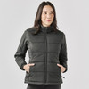 A women's puffer jacket in dark grey with a zip front, featuring side pockets and a high collar, with branding.