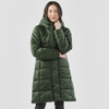 A long, green puffer jacket featuring a hood and a quilted design, presented on a model.