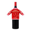 A drink bottle dressed in a red and pink knitted sleeve with a couple silhouette and heart motifs.