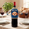 A drink bottle in a custom motif wine bottle sleeve featuring a dog design, with blue and cream colours.
